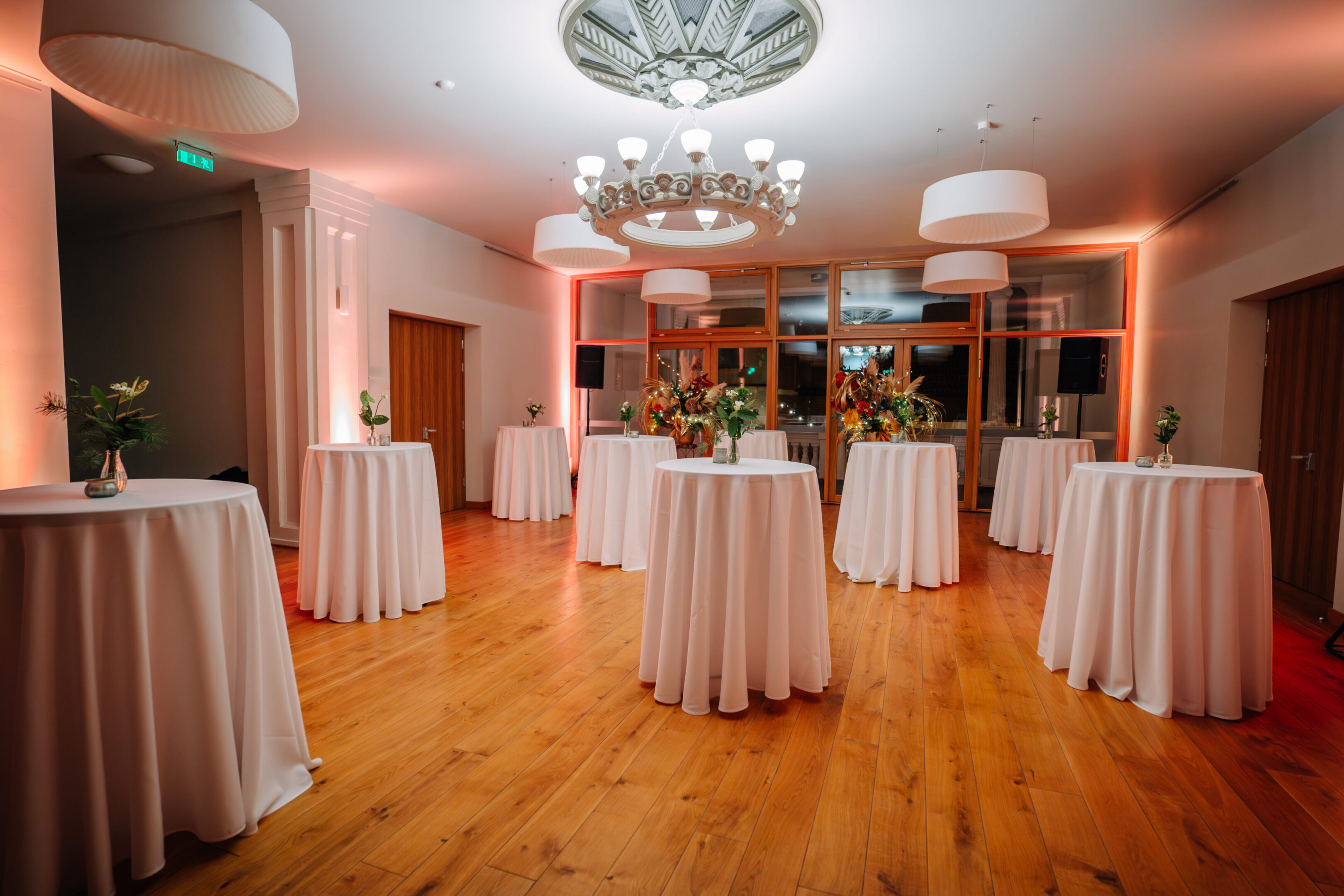 Elegant event space with tall tables