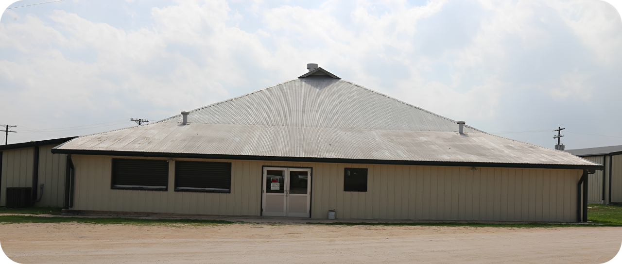 Pyramid-shaped building with metal roof
